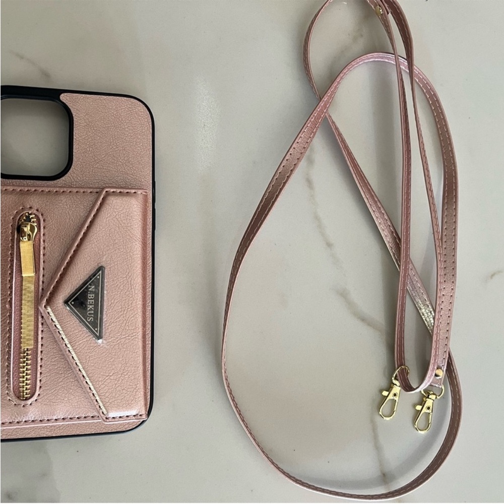 Beautiful I phone 13 pro max crossbody case.